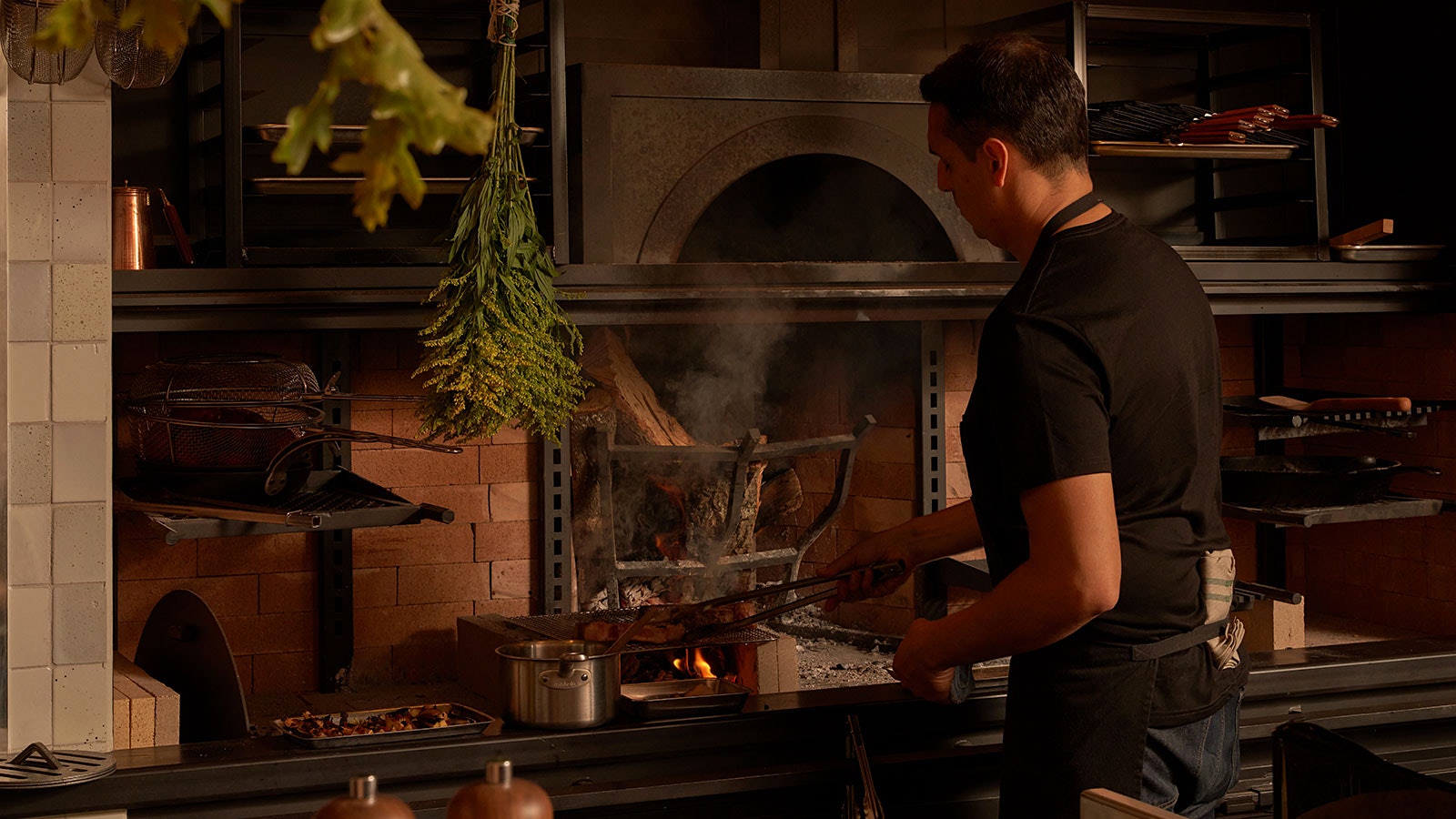 Chef Diego Moya at the hearth inside Little Moutain in Montecito, California